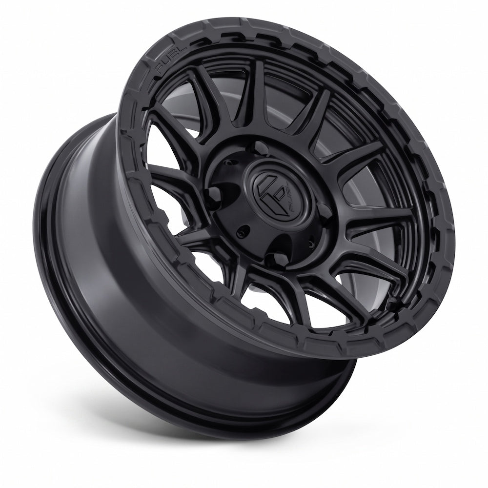 Fuel UTV FV866 Piston 15x7 4x137 Off-Road Wheel with Matte and Gloss Black Finish at a 3/4 angle on completely white background.