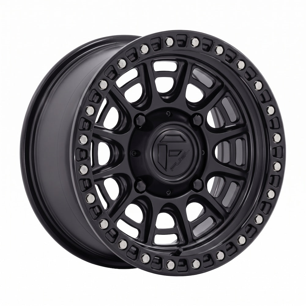 A single matte black with gloss black lip Fuel Cycle FV832 UTV wheel shown at a three-quarter angle on a plain white background.