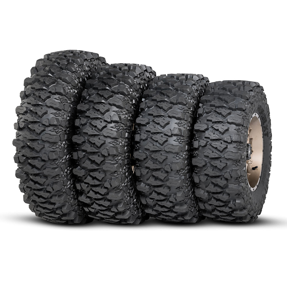Full lineup of Savage XT tires by ITP, stacked beside each other in a row, displaying the variety of sizes and profiles to fit a wide variety of sxs and utv applications.