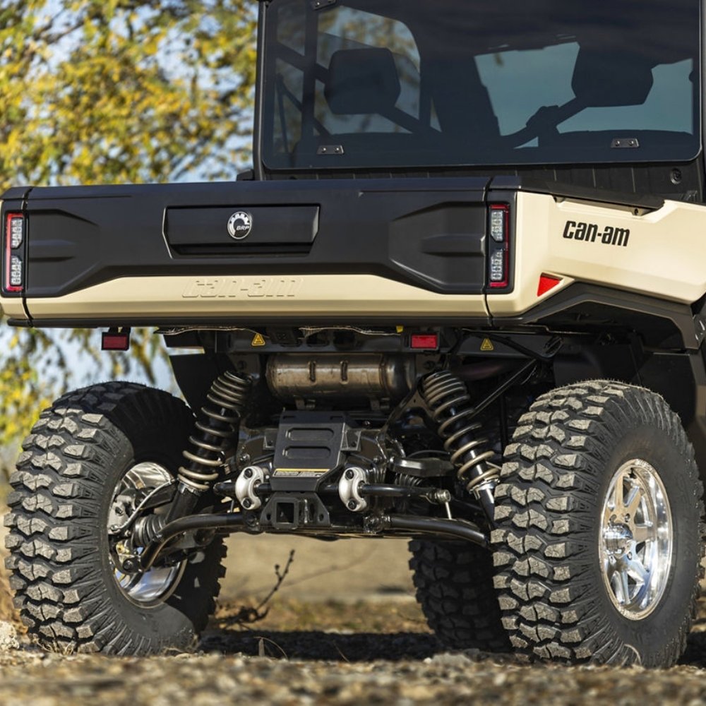 Photo of the rear of a Can-Am UTV with Sedona Rock-a-Billy tires and chrome wheels