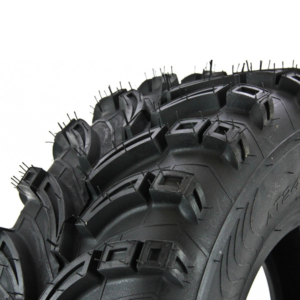 Close up view of the tread pattern and lug design with dimpled / pocketed lugs and textured casing between the lugs, designed to promote cleaning between the lugs.