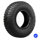 Angled view of the popular and proven Baja Champion BFGoodrich KM3 Mud Terrain T/A tire designed for high performance SXS and UTV models, featuring Traction Armor Sidewall Sculpting to protect against sidewall splitting, offered with fast and free shipping and 6-year manufacturer's limited warranty.