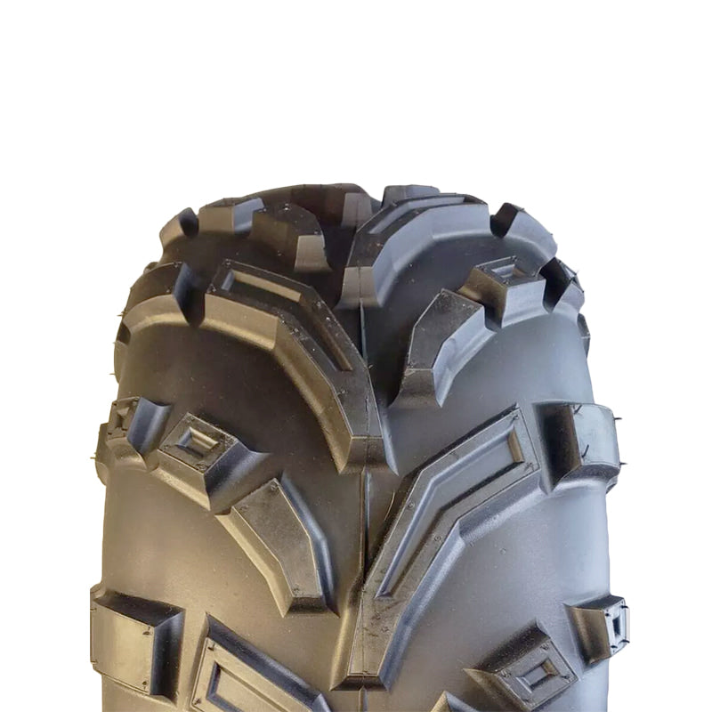 Close up view of the tread and casing details on the 440 Mag ATV and UTV tire, showcasing the alternating angled lugs with lug pockets designed to clear water, mud, and debris.