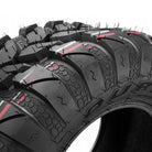 Close up detailed view of the casing, sidewall, and tread lug design of the high performance all-terrain radial tire by Duro, the DI-2037 Frontier front and rear directional tires.