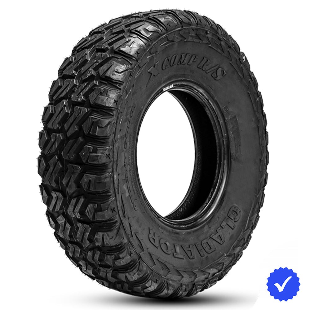 Angled view of the high performance steel belted radial 10-Ply Gladiator X-Comp R/S UTV and SXS racing tire in all-terrain style, with 95N load and speed index, featuring tough 10-ply construction and 15/32nds tread depth, offered with 100% free replacement warranty by American Pacific Industries (API), sold with free shipping.