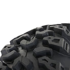 Close up view of the tread pattern and lug design featured on the all new T4 Roctane UTV and SXS tire by High Lifter STI, showcasing deep 3/4" to 1" deep lugs and staggered shoulder design to dig deep and hard in loose terrain.