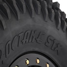 Close up detailed sidewall view of the High Lifter Roctane STX 8-ply radial tire, showcasing the aggressive sidewall lug design.