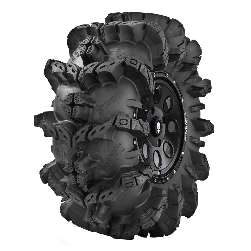Angled view showing extra deep lugs on Interco Black Mamba ATV and SxS mud tire.