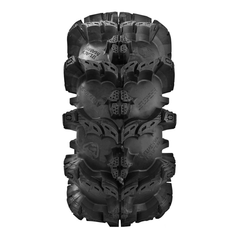 Tread pattern close up view on Black Mamba ATV tire, displaying large deep lugs with center tread block design.