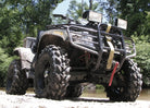 Swamp Lite ATV tires installed on 4x4 quad on the rugged trail.