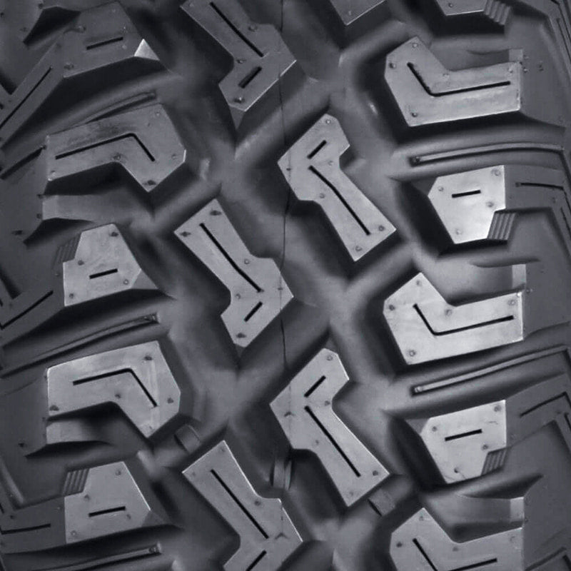 Close up view of the tread blocks and tread pattern of the ITP Coyote tire.