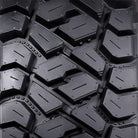 Detailed close-up view of the tread design and lug block details of the Intersect UTV tire by ITP Tire.