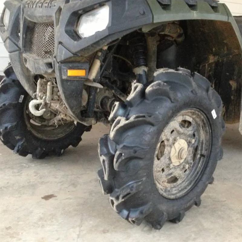 Muddy ITP Mega Mayhem tires installed on Polaris quad.