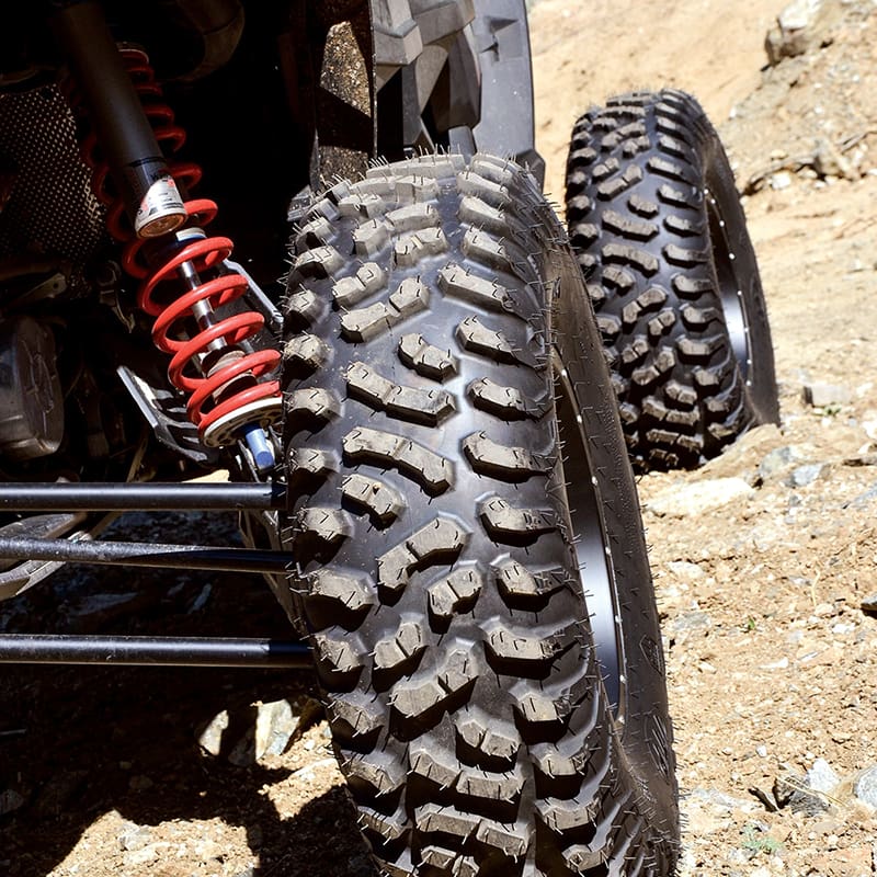Detailed view of Terra Hook radial tire installed on sxs in hard pack terrain.