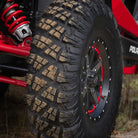 Close up of Versa Cross V3 all terrain tire by ITP installed and mounted on Polaris RZR side-by-side.