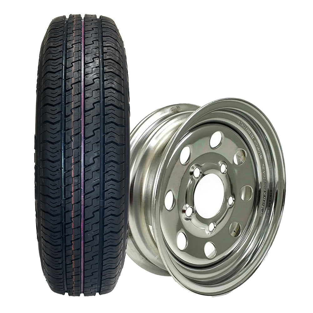 Kenda Karrier S-Trail Load Range D 12" trailer tire on chrome 12x4 steel wheel with 5x4.5" bolt pattern and zero offset.