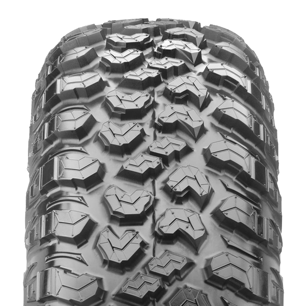 Close up detailed tread pattern view of the Maxxis RAZR XTZ UTV/SXS tire, featuring multi-angled tread blocks with ultimate biting edges and strategic siping to reduce stiffness, while also using integrated stone and mud ejector bars between the shoulder lugs to ensure mud and debris cleanout.