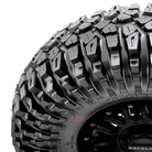 Close up view of the staggered heavy duty shoulder blocks of the Maxxis Roxxzilla standard and comp sticky versions UTV and SXS radial tire.