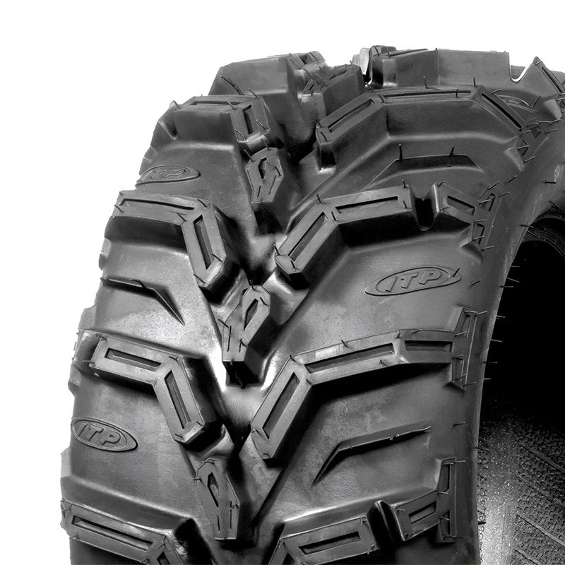 Close up view of the tread and lug pattern details of the new Mud Lite XTR radial off road UTV tire showing the lug pockets and multi-angle v-shaped directional pattern.