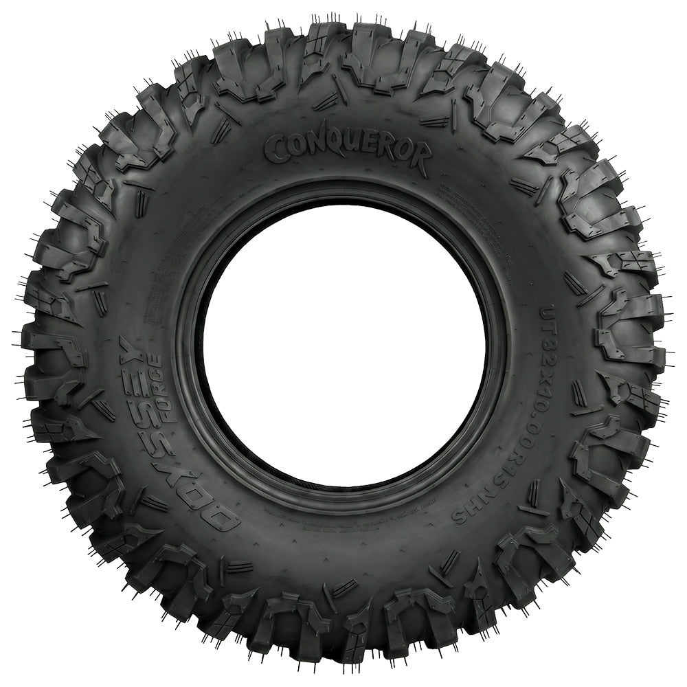 Full sidewall view of the Odyssey Conqueror UT32x10.00R15 UTV and SXS tire, showcasing the attractive Conqueror logo and wrap-around widely-spaced shoulder lugs for protection from rocks and punctures, while also promoting side traction for rocks and ruts.