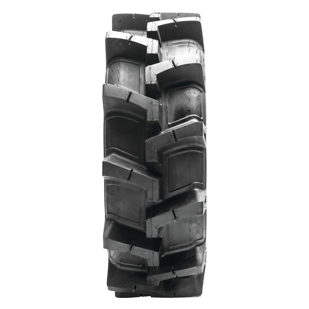 Full tread pattern and lug design view of the QBT608 UTV and SXS tire by Quadboss with tough Bias 6-ply construction and continuous center tread to improve road ride and noise, with aggressive ag lug style angled tread bars.