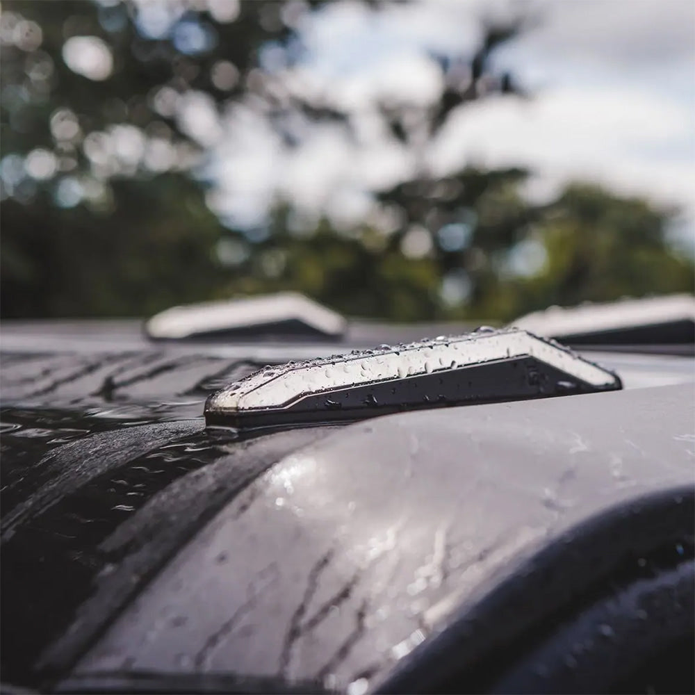 Ravek Apex turn signal light mounted horizontally on a UTV roof with secure adhesive, designed for easy mounting and installation.