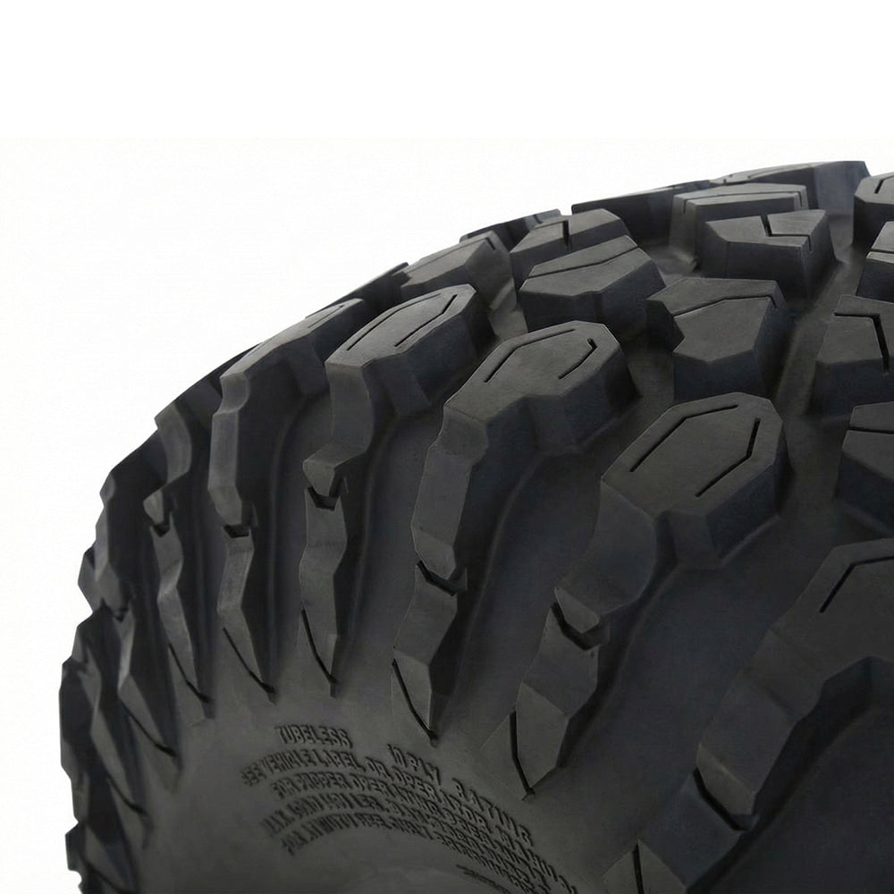 Close up, detailed view of the shoulder block tread pattern found on the System 3 XC450 UTV tire, featuring multi-angle tread blocks, siping, and wider spaced stepped shoulder lugs for off road and rock traction.