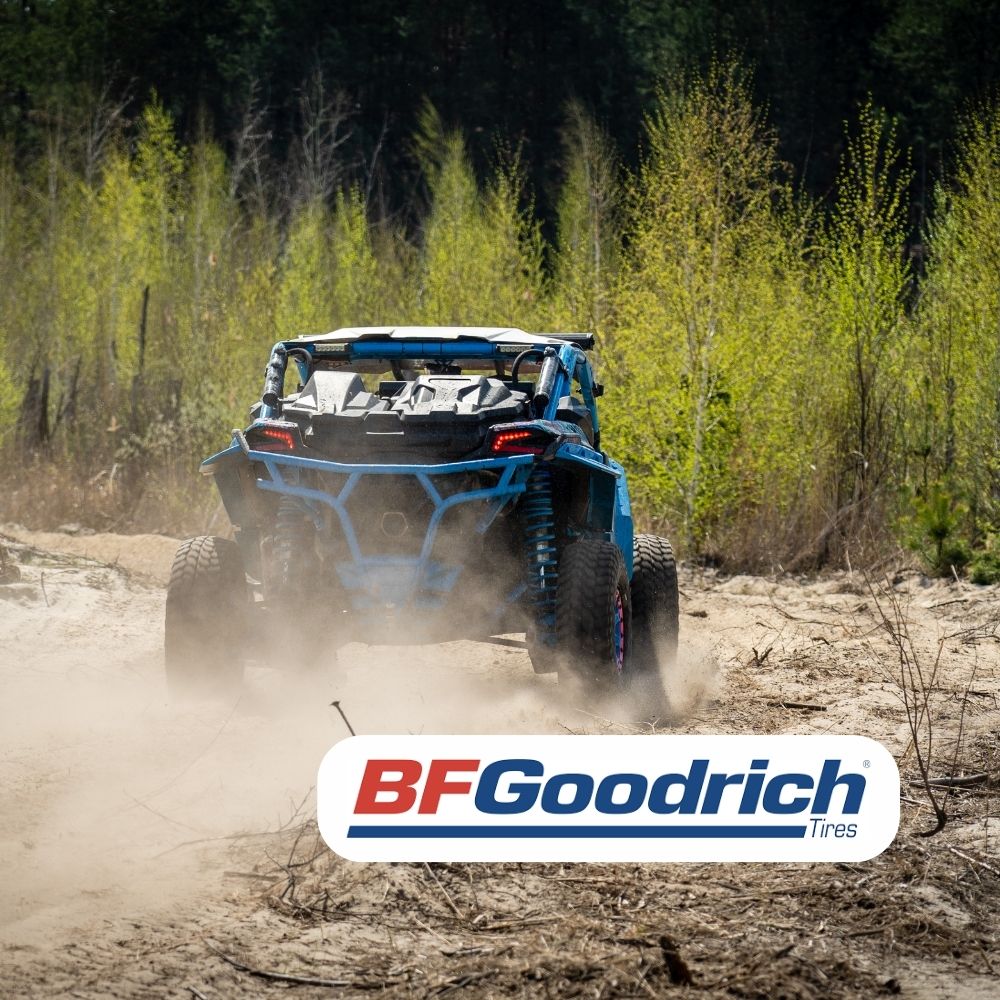 Sport UTV driving through dirt with BFGoodrich Tires  Logo