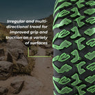 Tread pattern of the EFX MotoClaw highlighted green with text saying "Irregular and multi-directional tread for improved grip and traction on a variety of surfaces"