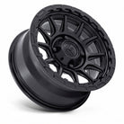 Fuel UTV FV866 Piston 15x7 4x137 Off-Road Wheel with Matte and Gloss Black Finish at a 3/4 angle on completely white background.
