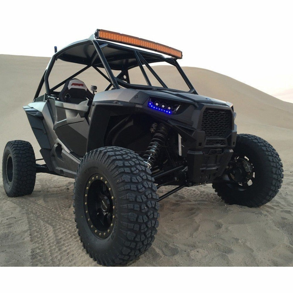 Aftershock XD tires installed on side by side in sand dunes.