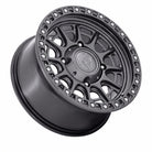 A Fuel Cycle Gloss Gunmetal UTV alloy wheel rim shown at an angle on a solid white background, featuring a visible Fuel logo in the center.