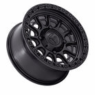 Fuel UTV FV832 CYCLE UTV 15x7 Matte Black with Gloss Black Lip Wheel shown at an angle on white background