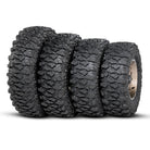 Full lineup of Savage XT tires by ITP, stacked beside each other in a row, displaying the variety of sizes and profiles to fit a wide variety of sxs and utv applications.