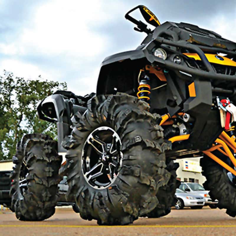 Can Am quad ATV with Interco Black Mamba off road tires mounted on it.