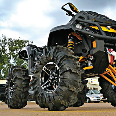 Can Am quad ATV with Interco Black Mamba off road tires mounted on it.