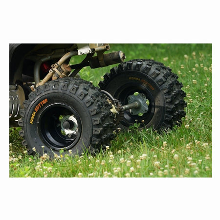 Close up view of the rear tires of an ATV showing Kenda Kutter XC tires