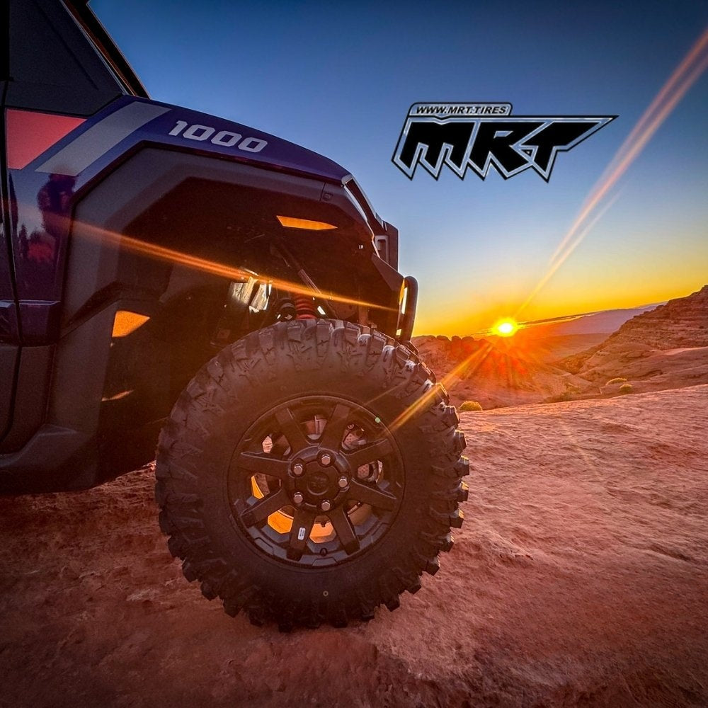 UTV with MRT tires in the dessert at sunset. MRT Tires logo placed in image.