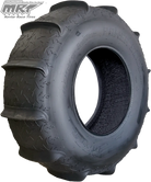 Angled view of the MRT Power Slide rear paddle tire for sand and dunes, featuring a 12-paddle design and radial 4-ply construction, offered for sale with free shipping by authorized dealer Ride or Die Tire.