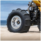 Close up of Tensor Sand Series rear tire on a UTV on sand