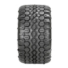 View of the tread pattern and lug design, including wrap-around open shoulder tread blocks, that provide great traction and clean out, on the OTR 38 SPECIAL 6-ply tire.