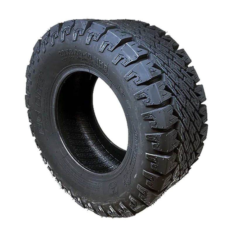 Additional angled view of a non-mounted Big Bite OTR replacement mower tire displaying the open edge tread block design for good cleanout and traction.