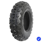 Angled view of the AMS Pactrax ATV and Quad front tire, featuring aggressive knob design and tough bias-ply construction, engineered to track straight at high speeds, offered for sale with free shipping.