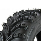 Close up view of the tread pattern and lug design with dimpled / pocketed lugs and textured casing between the lugs, designed to promote cleaning between the lugs.