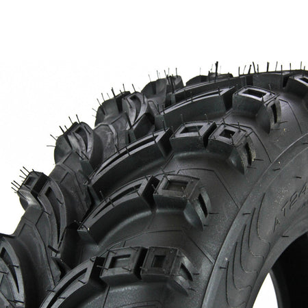 Close up view of the tread pattern and lug design with dimpled / pocketed lugs and textured casing between the lugs, designed to promote cleaning between the lugs.