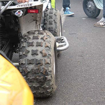 Arisun XC Plus ATV tires mounted on race quad.