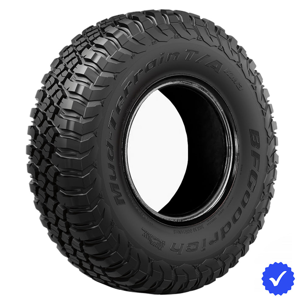 Angled view of the popular and proven Baja Champion BFGoodrich KM3 Mud Terrain T/A tire designed for high performance SXS and UTV models, featuring Traction Armor Sidewall Sculpting to protect against sidewall splitting, offered with fast and free shipping and 6-year manufacturer's limited warranty.