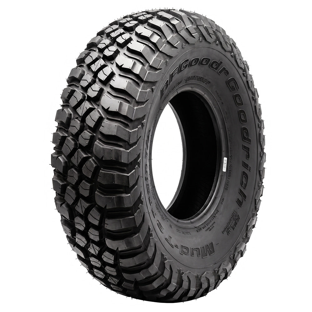 Angled view of the popular and proven steel belted radial Baja Champion BFGoodrich KM3 Mud Terrain T/A tire designed for high performance SXS and UTV models, featuring Traction Armor Sidewall Sculpting to protect against sidewall splitting, offered with fast and free shipping and 6-year manufacturer's limited warranty, all sizes feature fast and free shipping.