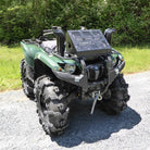 Black Mamba Lite ATV mud all terrain 6-ply tires mounted on Yamaha 4x4 quad atv.