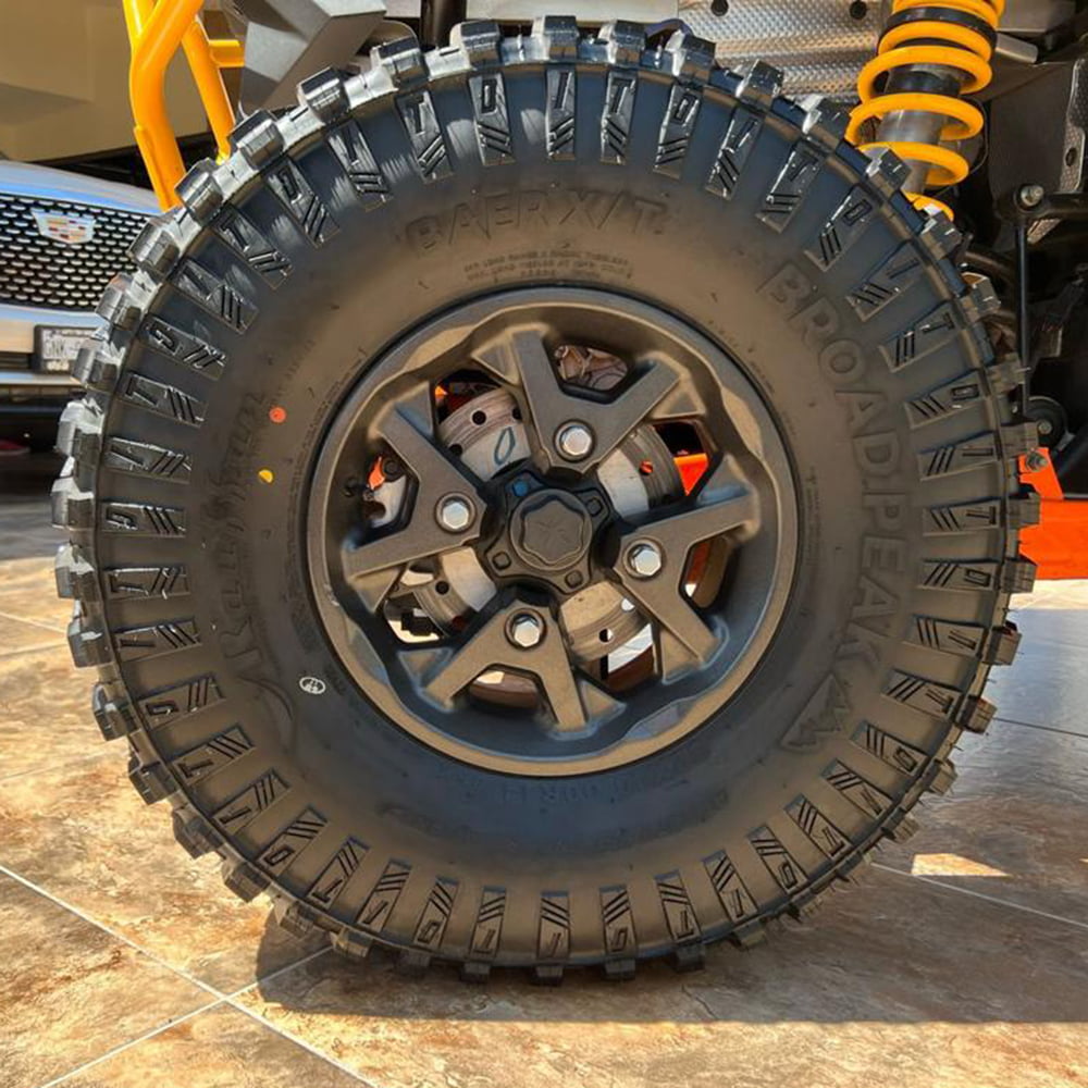 Broad Peak Baer X/T tire mounted on rim and installed on customer side by side.